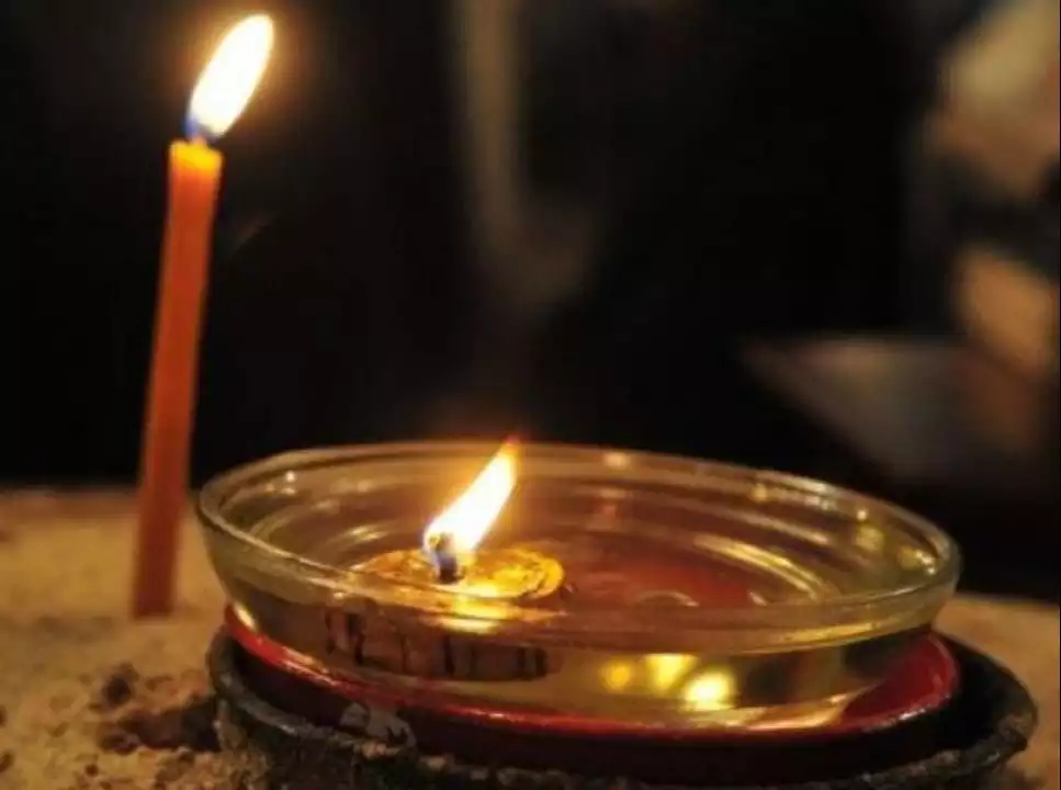 Holy-Unction-with-blessed-oil-and-glowing-candle