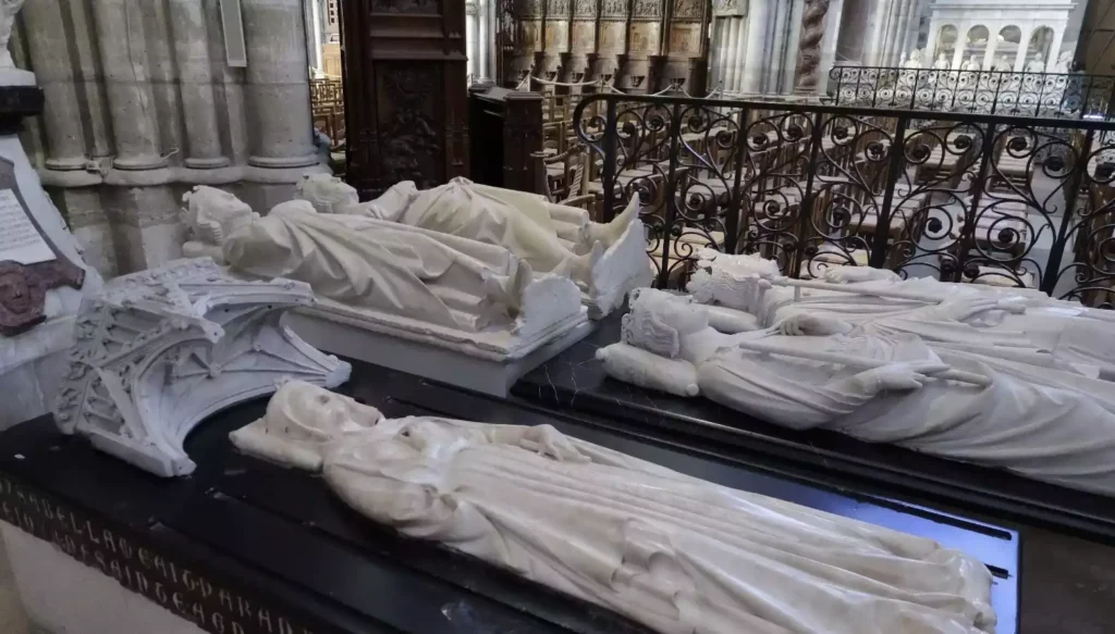 French Third Republic: Intricate sculptures adorn majestic tombs at Saint-Denis Basilica, Paris.